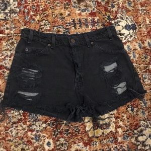 Distressed black high-waisted Levi shorts